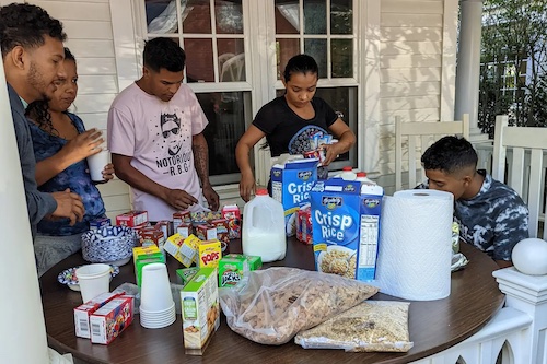 migrants eat breakfast donated by residents photo twitter repdylan copy 2
